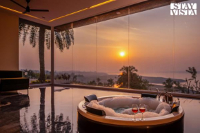 StayVista's Lake Pearl Serenity - Riverside, Mountain-View Villa with Jacuzzi, Sprawling Lawn & Terrace
